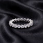 1.90 ctw round brilliant lab grown diamond eternity wedding band resting flat on dark black silk