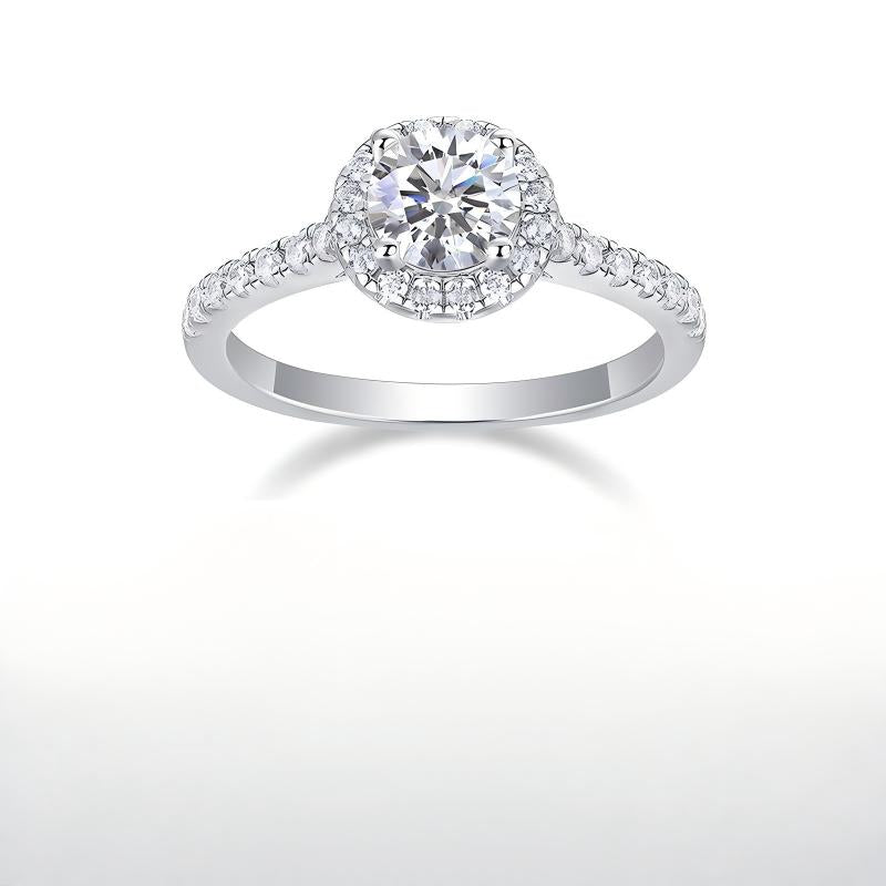 Front symmetrical view of 1 carat round moissanite halo ring with micro pave band.
