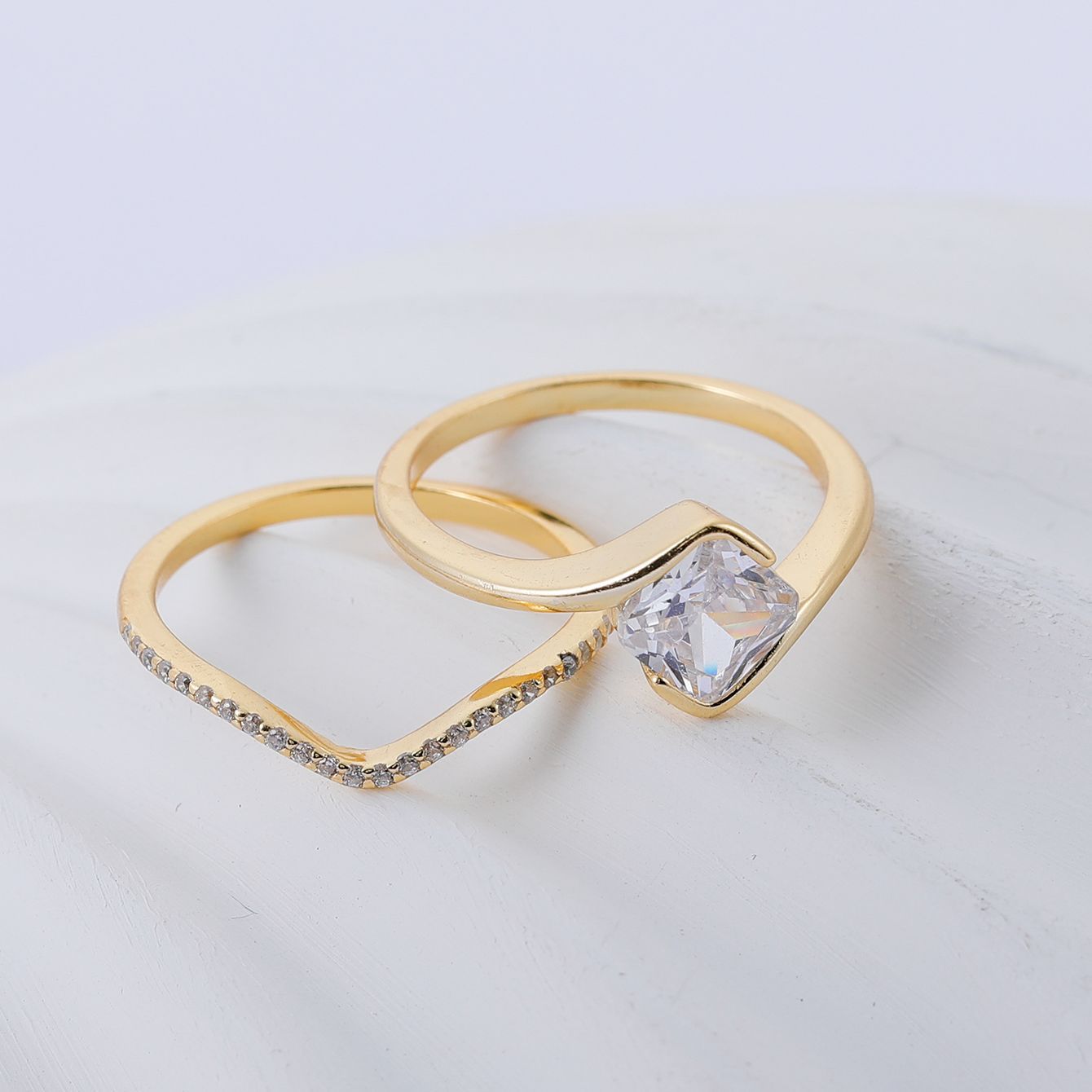 Yellow gold square diamond set on neutral background. Alt: “1.2CT Square Diamond Stacking Set – 18K Yellow Gold.”