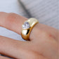 Ring worn as romantic engagement or promise ring. Alt: “Heart Led: Moissanite Engagement Ring.”