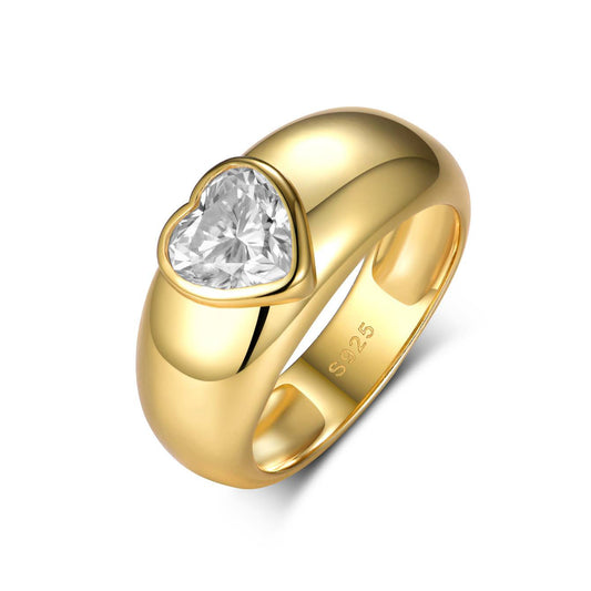 Yellow gold heart moissanite ring on soft romantic background. Alt: “1.2ct Heart Shaped Moissanite Engagement Ring – 18K Yellow Gold.”