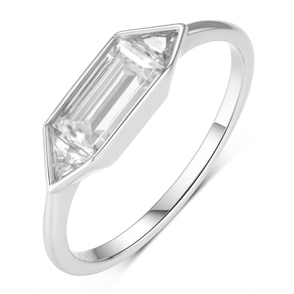 Clean, modern flat lay featuring 4–5 geometric rings on architectural backdrop. Alt: “1.4CT Geometry Moissanite Engagement Rings – Modern Collection.”
