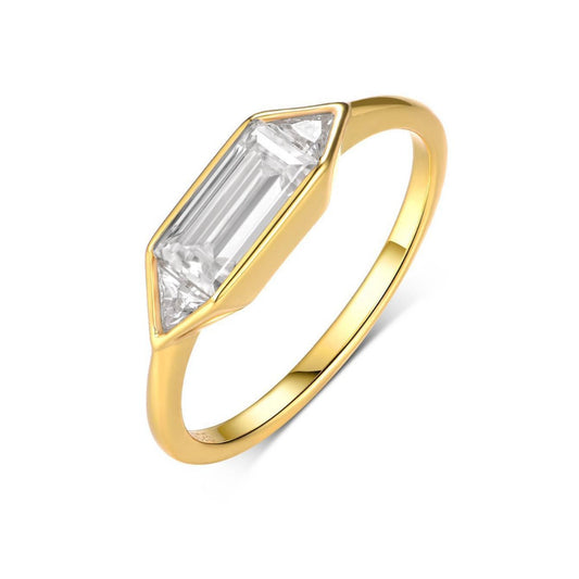 Clean, modern flat lay featuring 4–5 geometric rings on architectural backdrop. Alt: “1.4CT Geometry Moissanite Engagement Rings – Modern Collection.”
