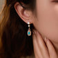 Model Wearing Jade Serenity Earrings – Elegant Oriental Style