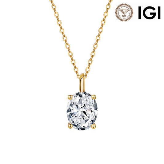 A gold pendant necklace with an oval-cut clear gemstone in a four-prong setting, suspended from a delicate gold chain. The IGI logo is visible in the top right corner.