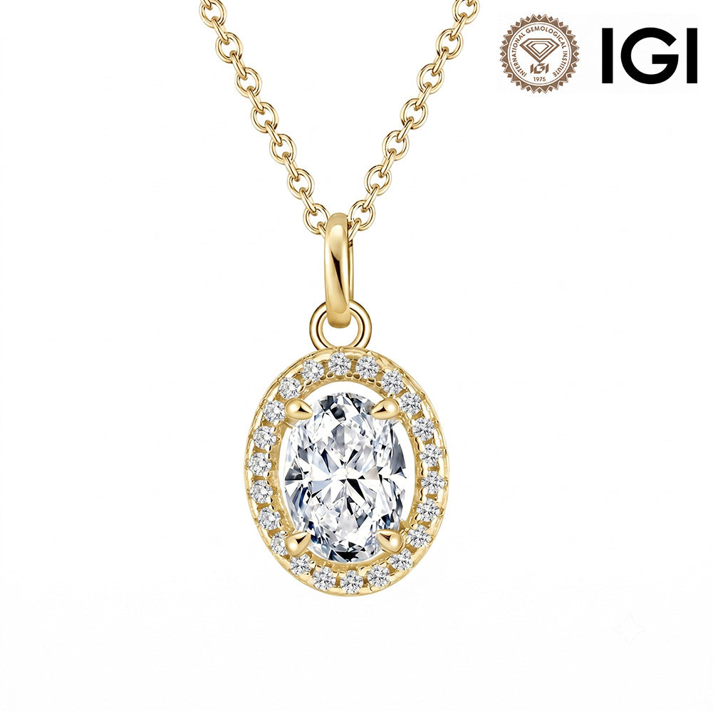 A gold oval pendant necklace featuring a large round-cut clear center stone surrounded by a halo of small clear stones, shown on a white background with an IGI logo in the top right corner.