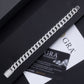 High-definition shot of the bracelet laid flat and fully extended on pure white.