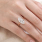 Model wearing 10k yellow gold marquise cut lab diamond solitaire V shaped engagement ring on hand