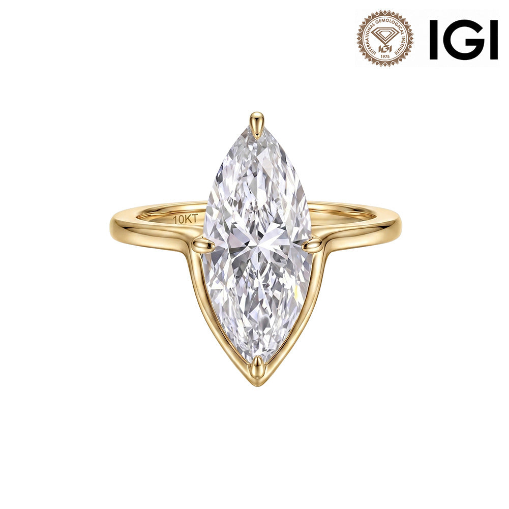 10k yellow gold marquise cut lab diamond solitaire V ring with IGI logo isolated on white studio background