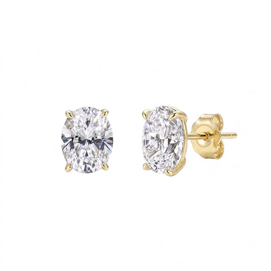 10k yellow gold 7x11mm oval cut lab-grown diamond stud engagement earrings pair on white studio background