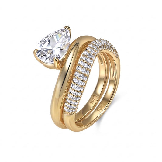10k yellow gold pear cut lab diamond solitaire engagement stacking ring set with pave band isolated on white background