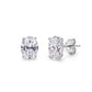 10k white gold 8x13mm oval cut lab-grown diamond stud engagement earrings pair on white studio background