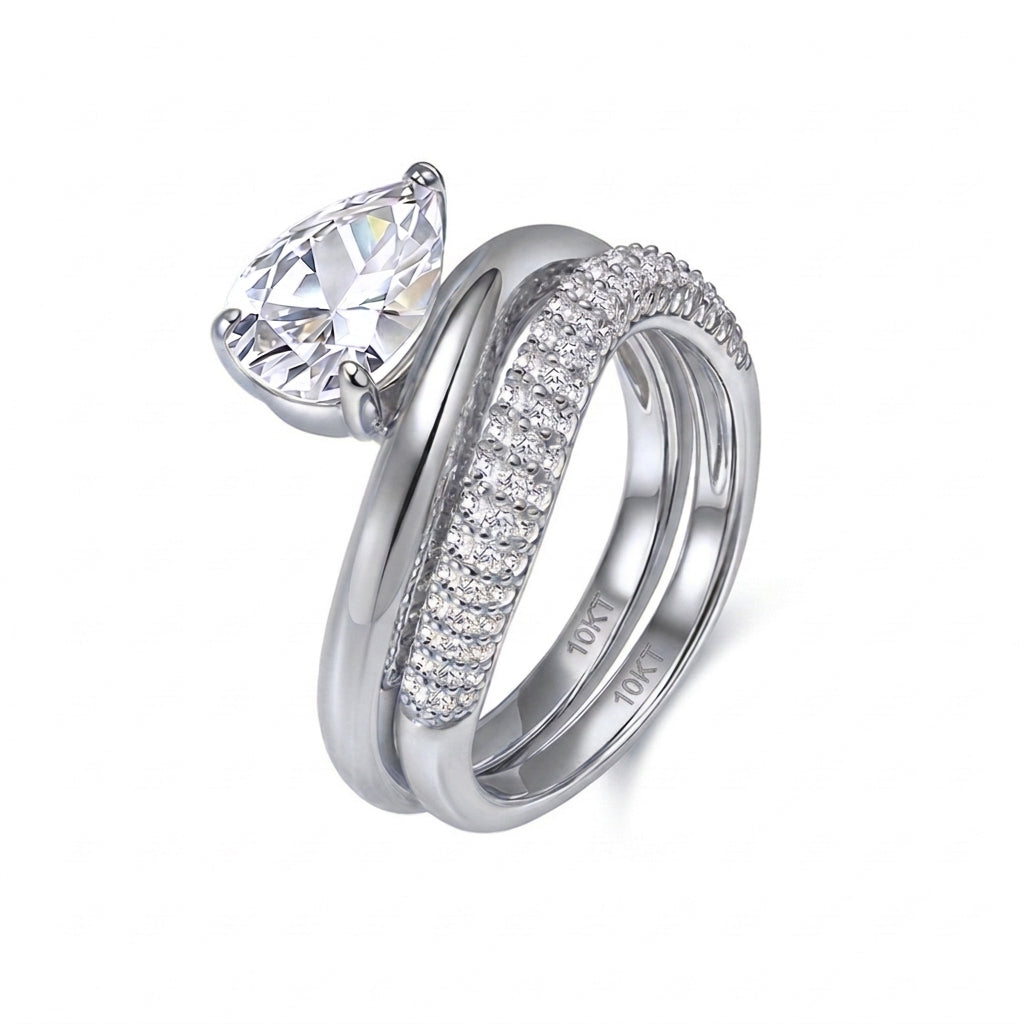 10k white gold pear cut lab diamond solitaire engagement stacking ring set with pave band on white background