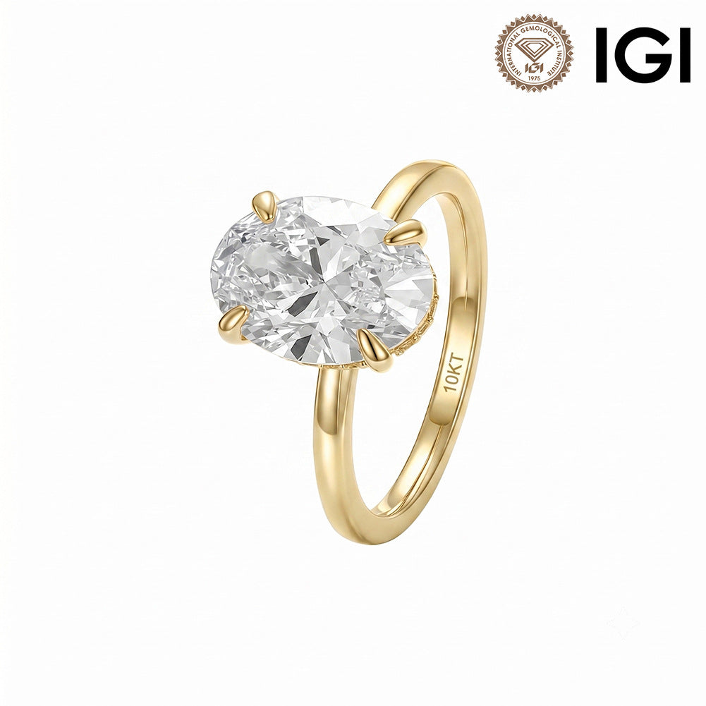 10k yellow gold 2 ct oval cut lab diamond solitaire engagement ring with IGI logo isolated on white studio background