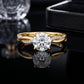 10k yellow gold round cut lab-grown diamond twist vine engagement ring on black reflective background   