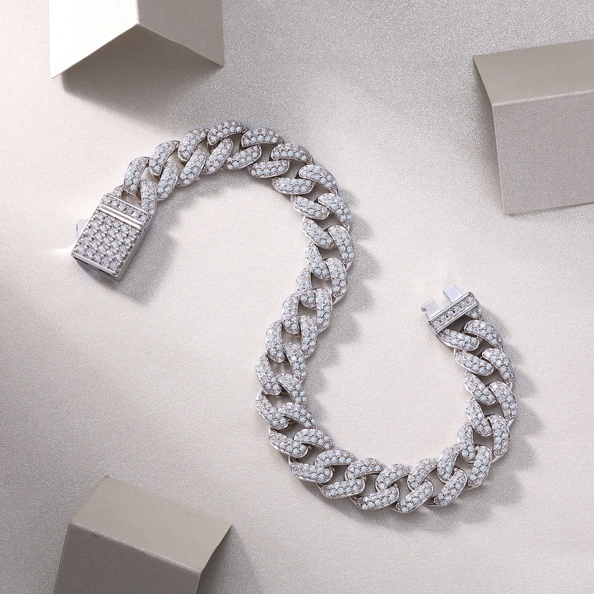 Focus on the pavé setting on the flat surface and the sharp 90-degree edges.