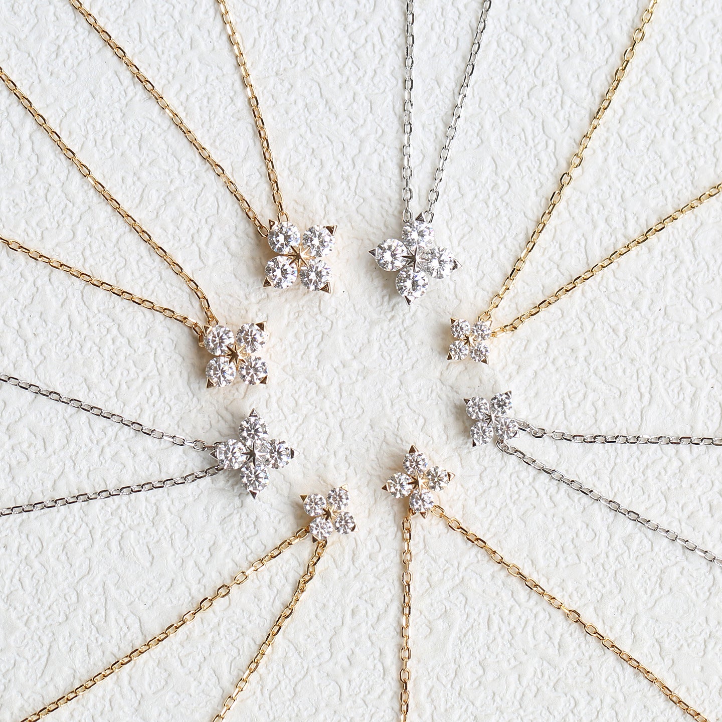  Clover pendant on soft green or cream background. Alt: “14K Gold-Plated Moissanite Four-Leaf Clover Necklace.”