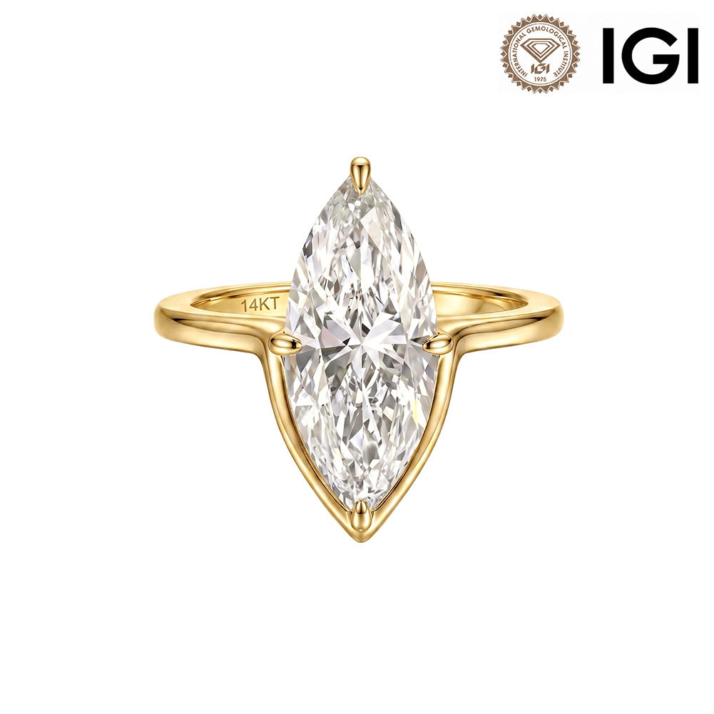 14k yellow gold marquise cut lab diamond solitaire V engagement ring with IGI logo isolated on white studio background   