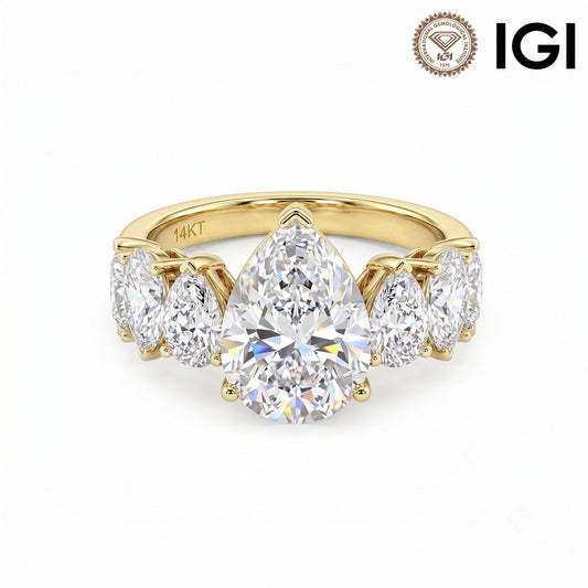 14k yellow gold pear cut lab-grown diamond five-stone engagement ring with IGI logo on white studio background