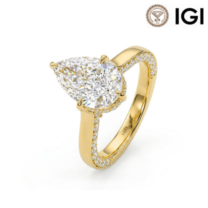 14k yellow gold pear cut lab-grown diamond hidden halo pave engagement ring with IGI logo on white studio background