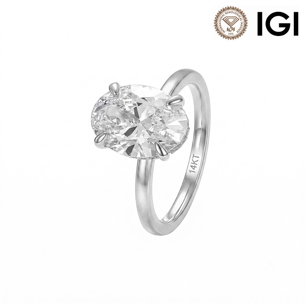 14k white gold 2 ct oval cut lab diamond solitaire engagement ring with IGI logo isolated on white studio background