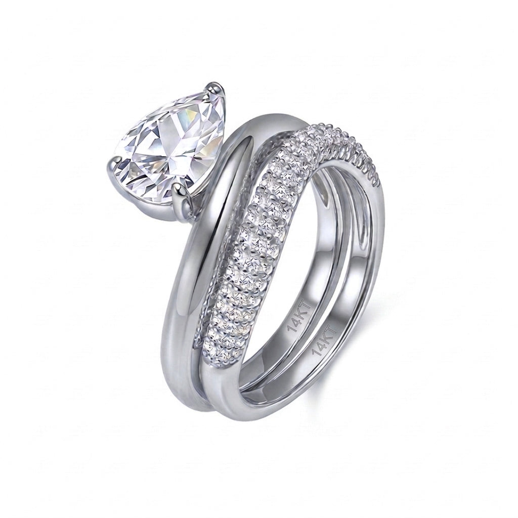 14k white gold pear cut lab diamond solitaire engagement stacking ring set with pave band on white background