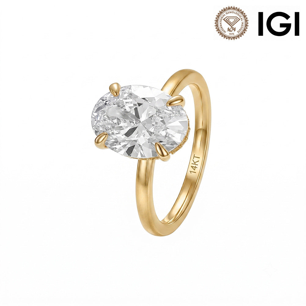 14k yellow gold 2 ct oval cut lab diamond solitaire engagement ring with IGI logo isolated on white studio background   
