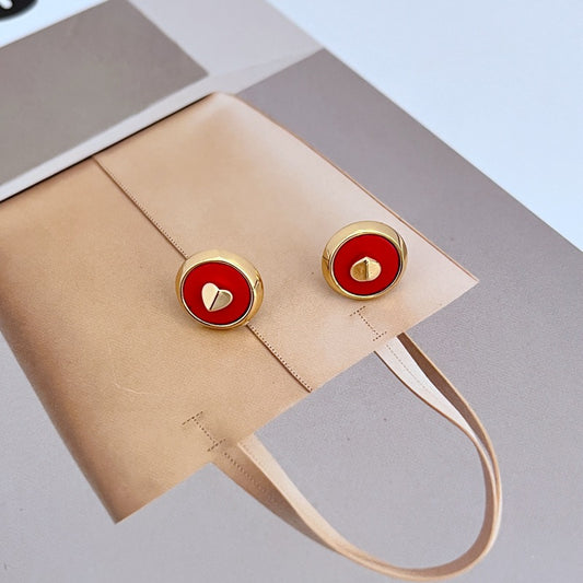 Assortment of heart spacer beads displayed on a clean white background, showcasing the glossy enamel colors and gold-filled rims. Alt: “18K Gold Filled Heart Spacer Beads – Enamel Love Beads for Women.”