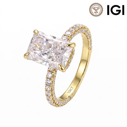 18k yellow gold 1ct radiant cut lab-grown diamond pave engagement ring with IGI logo on white studio background
