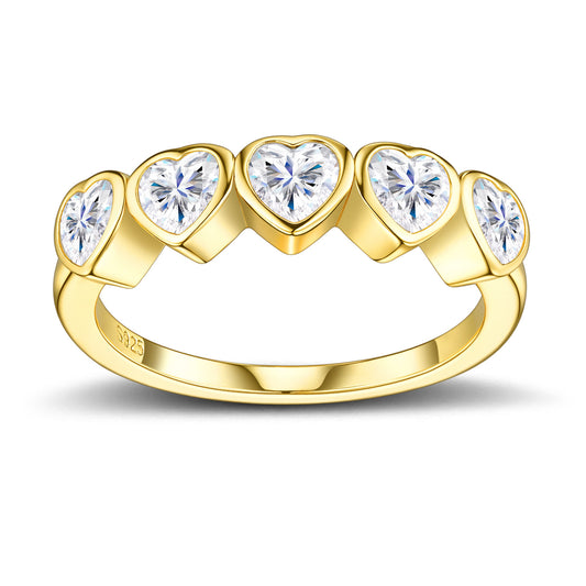 Frontal studio display of an 18k gold plated 925 sterling silver five heart moissanite bezel set ring.