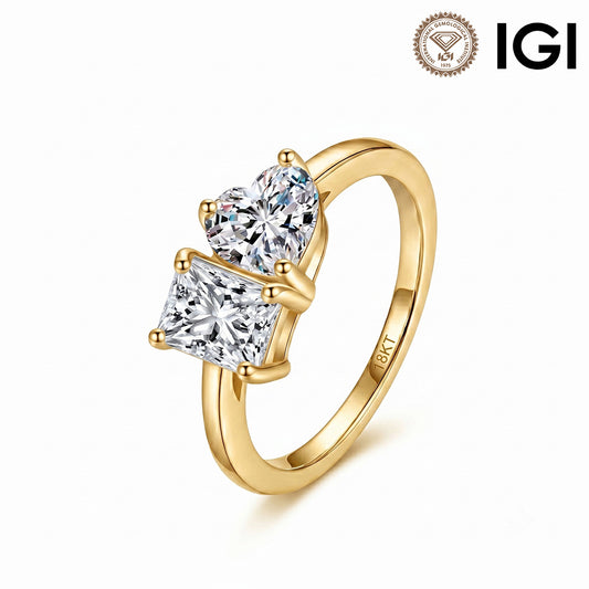 18k yellow gold heart and princess cut toi et moi lab-grown diamond engagement ring with IGI logo isolated on white background