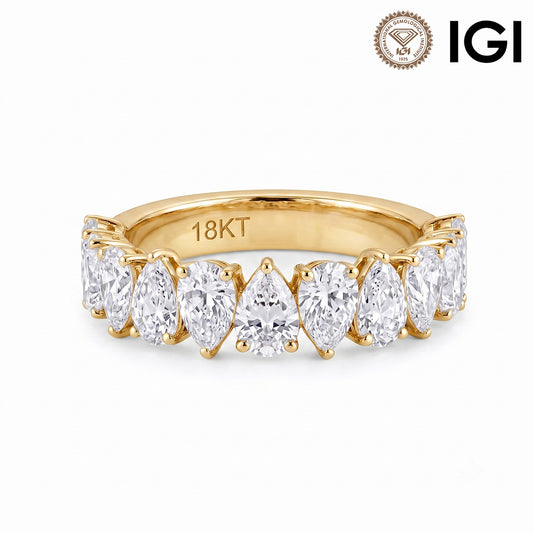 18k yellow gold pear cut lab diamond eternity engagement ring with IGI logo isolated on white studio background