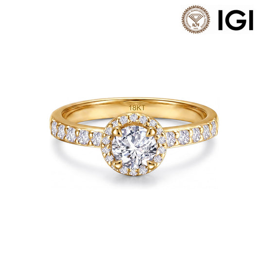 18k yellow gold round brilliant lab diamond halo engagement ring with pave band and IGI logo on white studio background