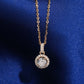 18k rose gold 5mm round halo lab-grown diamond clavicle pendant necklace on royal blue silk background   
