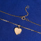 Smooth polished back and spring ring clasp of 18k rose gold diamond heart pendant necklace