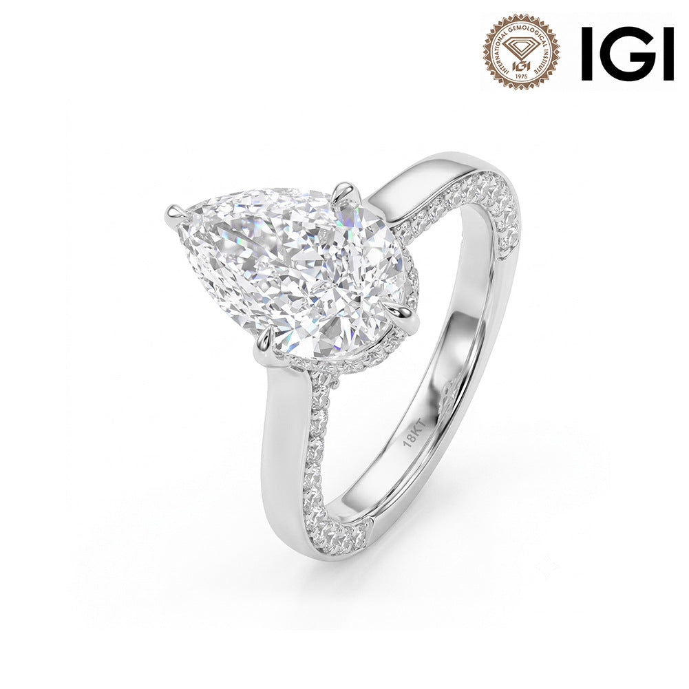 18k white gold pear cut lab-grown diamond hidden halo pave engagement ring with IGI logo on white background   