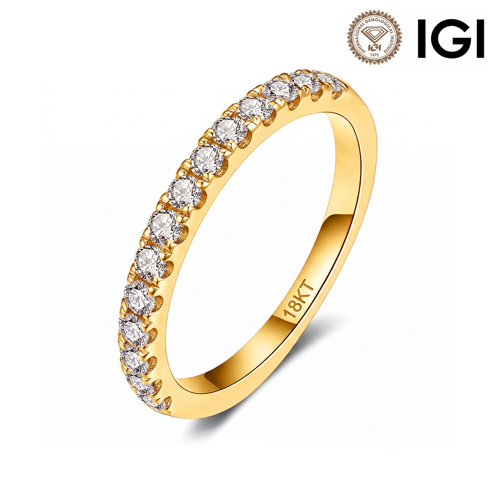 18kt gold round brilliant lab-grown diamond half eternity wedding ring with IGI logo on white studio background