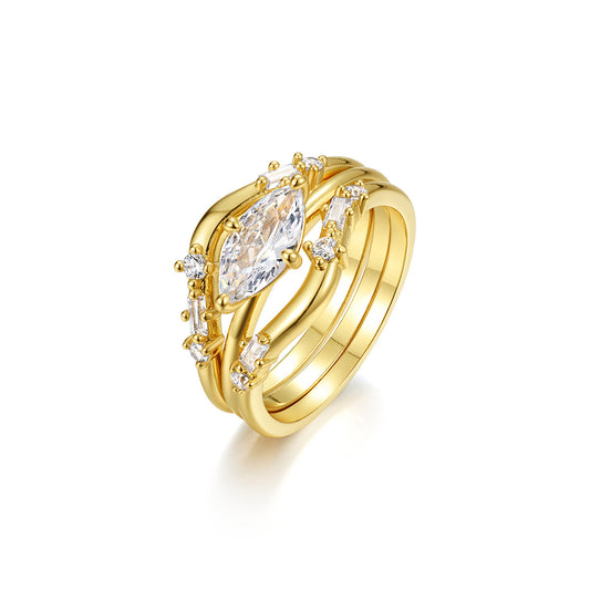 Yellow gold oval stacking set on neutral background. Alt: “1CT Oval Diamond Stacking Ring Set – 18K Yellow Gold.”