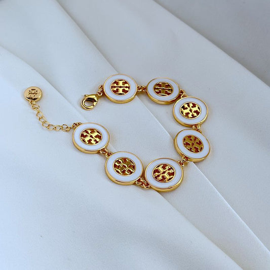 Tory Burch Gold and White Medallion Bracelet