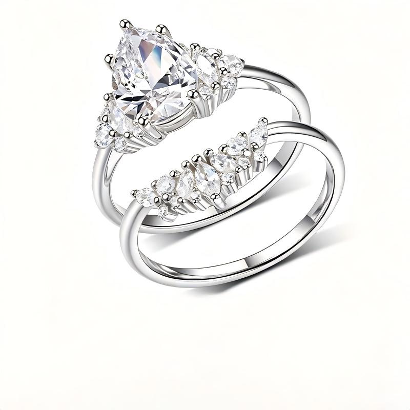 Pear Cut Moissanite Cluster Solitaire and Curved Crown Stacking Ring