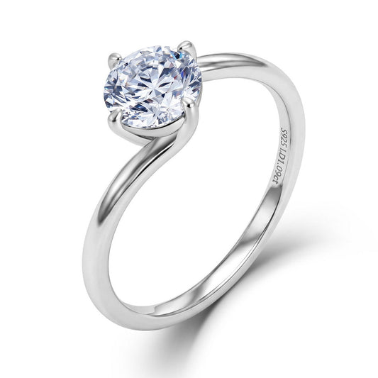 Side elevation view showing smooth fluid bypass shank on 1ct round diamond solitaire ring.