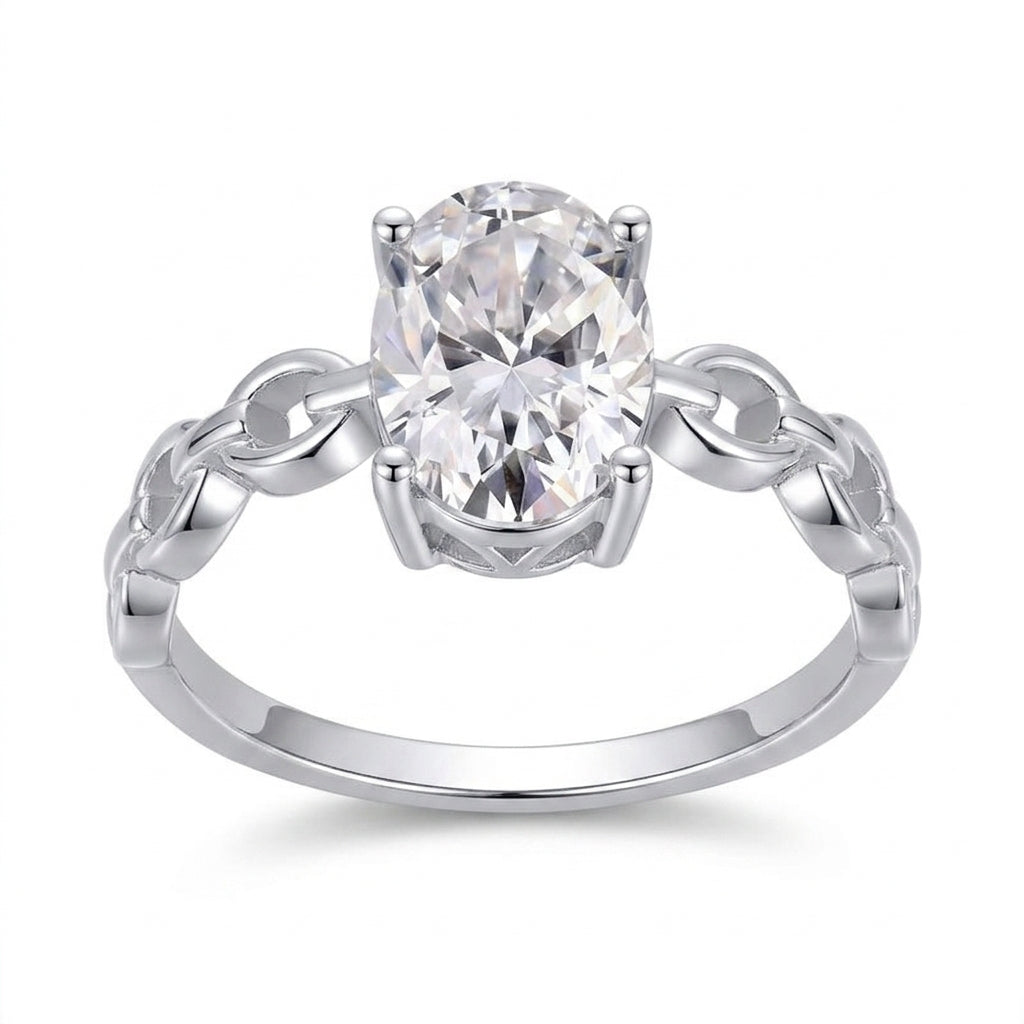 1ct oval cut moissanite engagement ring with silver interlocking chain link band on white background.