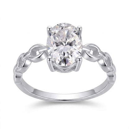 1ct oval cut moissanite engagement ring with silver interlocking chain link band on white background.