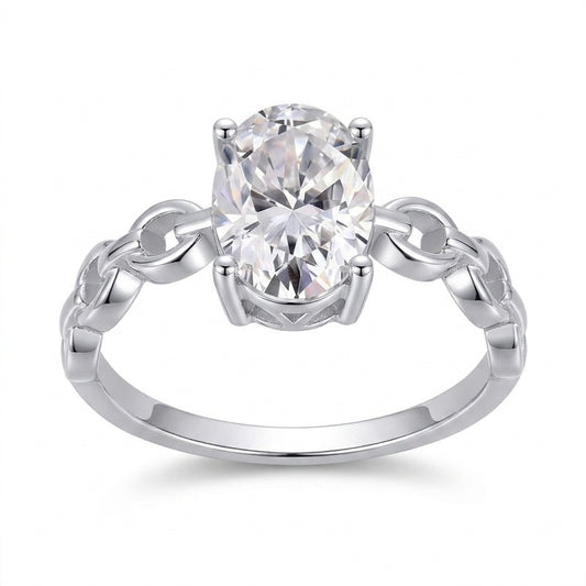 1ct oval cut moissanite engagement ring with silver interlocking chain link band on white background.