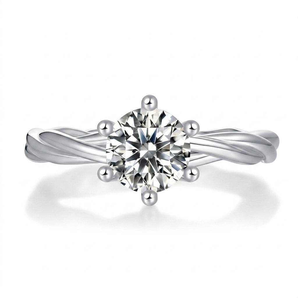 1ct round cut moissanite engagement ring with 6-prong setting and plain twisted vine band on white background.