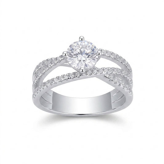 1ct round cut moissanite crossover engagement ring with criss cross pave band on white background.