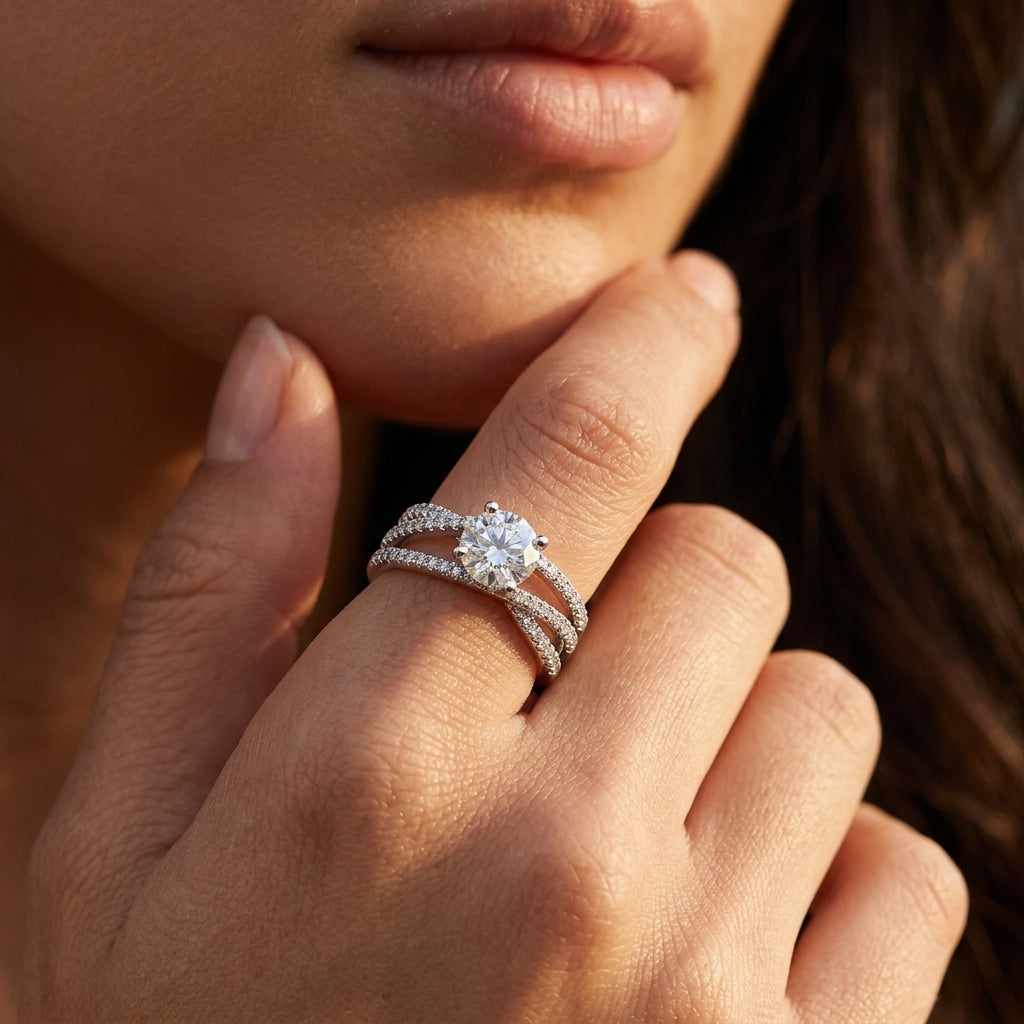 Close-up view of a model wearing 1ct round moissanite crossover engagement ring.
