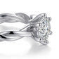 Side profile view showing 6-prong crown basket setting and twisted shank detail on silver moissanite ring.