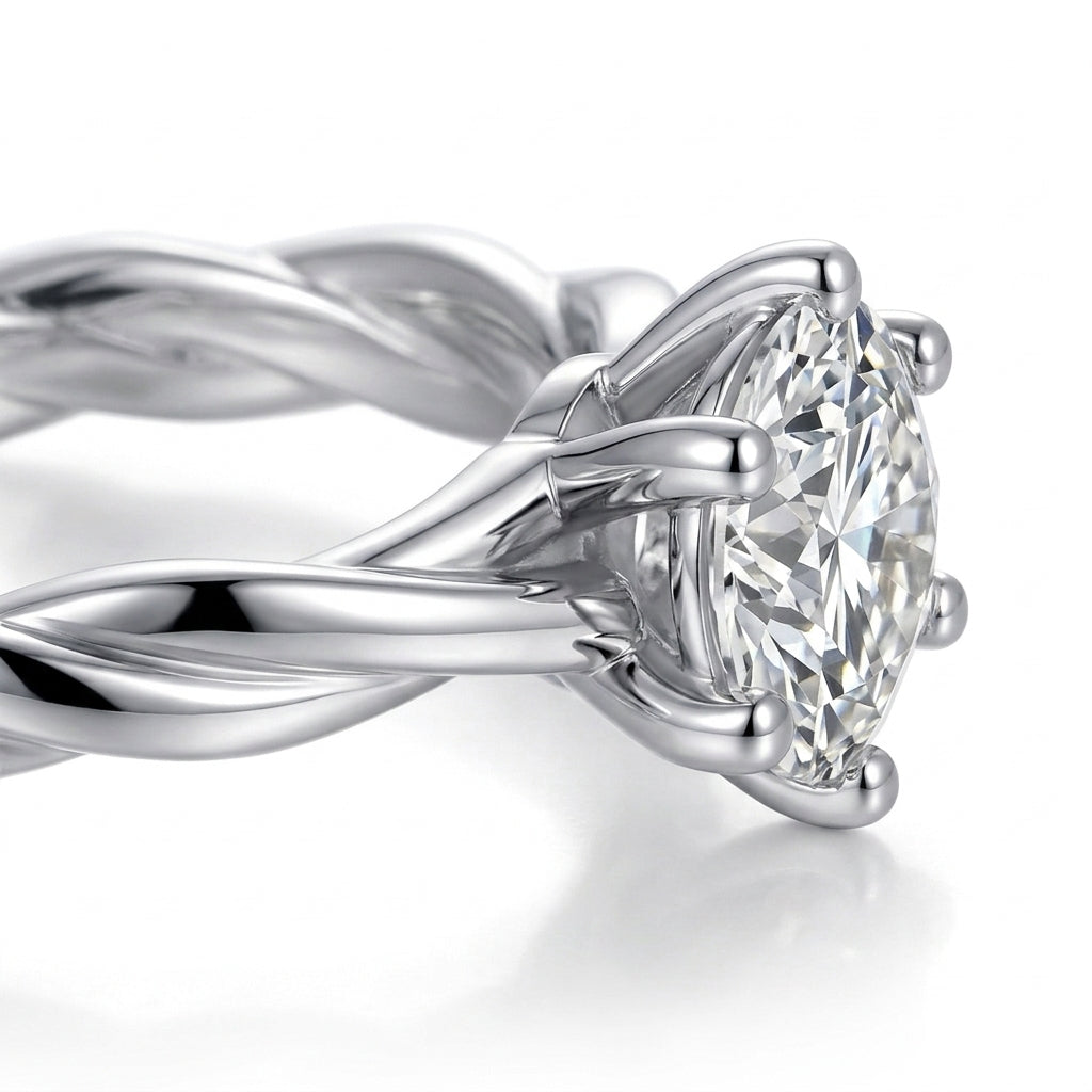 Side profile view showing 6-prong crown basket setting and twisted shank detail on silver moissanite ring.