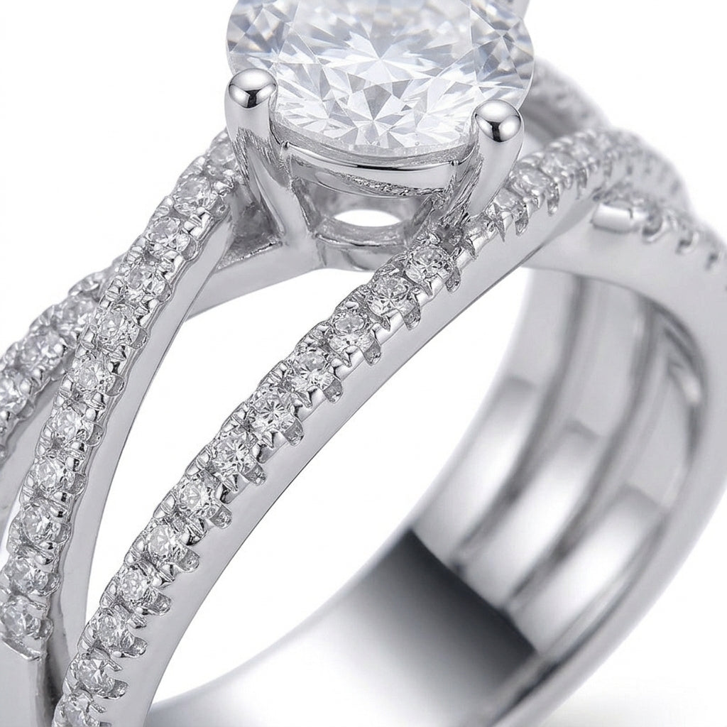Macro close-up view showing four-prong basket setting and criss-cross pave shank on 1ct moissanite ring.